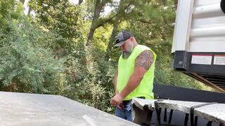 Bearded truck driver pissed on the street