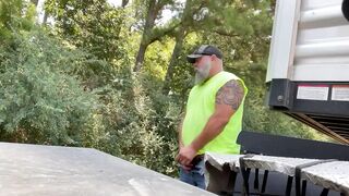 Bearded truck driver pissed on the street