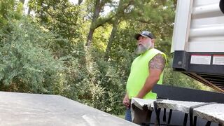 Bearded truck driver pissed on the street