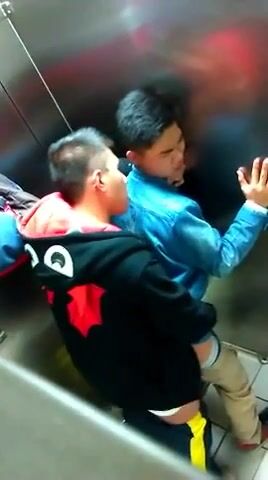 Asian twinks gay porn caught fucking in public toilet stall. Spy caught too.