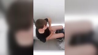 Twink jerks off in the stall