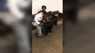 Two homeless black men having oral fun at a subway station