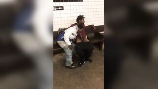 Two homeless black men having oral fun at a subway station