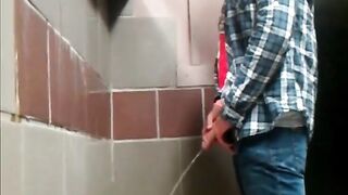 Two big dicks spied on while pissing