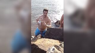 Latino pissing on the beach