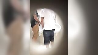 Caught dude sucking cock in public restroom