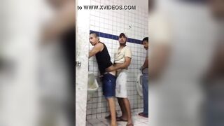 giving his ass to a horny dude in front other people in public restroom