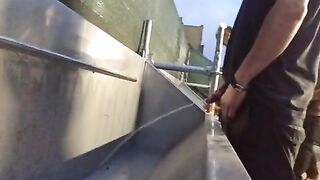 Handsome guys spied pissing at urinal