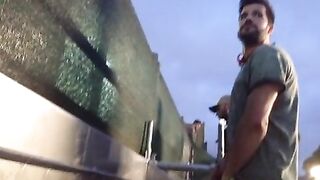 Handsome guys spied pissing at urinal