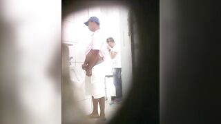 teen spies on men in the public bathroom