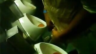 Spy urinal Latin bar