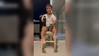 midget young guy rubbing his cock solo on a chair