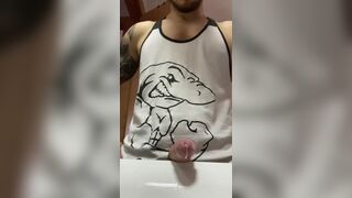 Muscular tattooed dude with a huge cock shooting a load in the bathroom sink