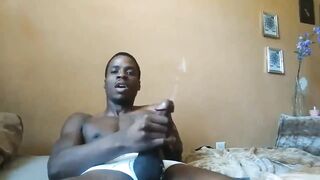 African dude firing a huge semen lava
