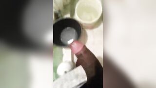 Horny black jerks off in the bathroom