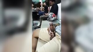 Horny black showing off his cock on the street