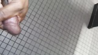 Caught a big black cock stroking in the gym bathroom