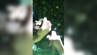 Horny youngsters jerk off and finger each other's cocks in the bushes