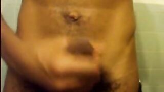 Sexy hairy african dude shows his long beefy cock