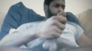 Bearded black daddy rubbing his delicious cock