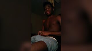 Young black dude wanking his cock intensely