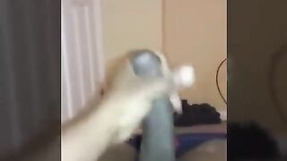 Horny black strokes his huge silken cock