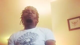 Horny jamaican guy strokes his cock slowly
