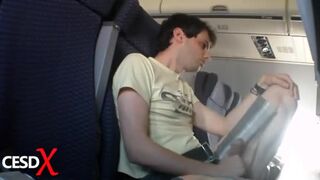 Horny guy rubbing his cock in a commercial airplane