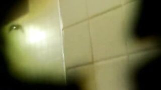 Spying on a guy in the gym bathroom