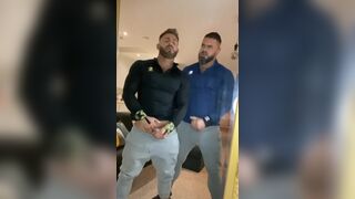Two beautiful studs masturbate and kiss in front of the webcam