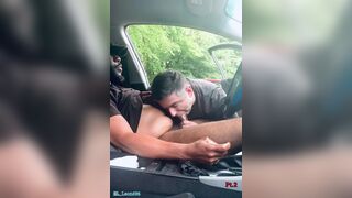 Married guy sucks a horny black dude's cock in park parking lot