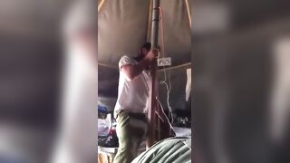 Horny guy putting on a show in the military tent