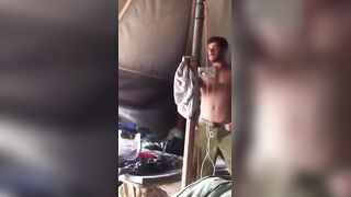 Horny guy putting on a show in the military tent