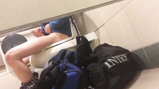 Spying a horny guy masturbating in a toilet