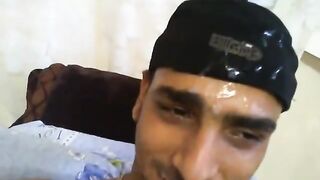 Latin thug stroking his oiled beefy cock