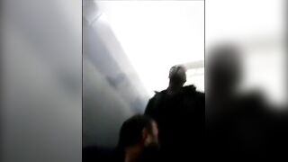 White guy sucks a black guy cock in a public toilet