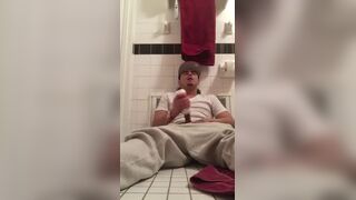 Young dude using a flesh light to masturbated in the bathroom