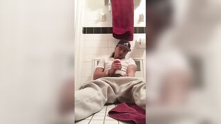 Young dude using a flesh light to masturbated in the bathroom