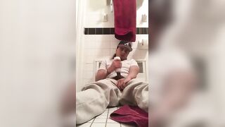 Young dude using a flesh light to masturbated in the bathroom