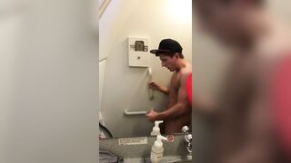 Young  dude having a huge orgasm in airplane's bathroom
