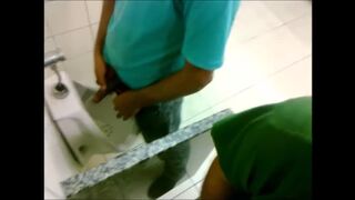 Jerking off a straight guy while urinating