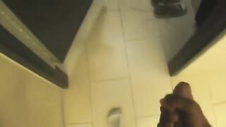 Horny young nigga puts on a show alone in a public toilet