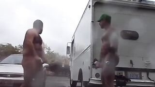 Two strangers masturbate in a public parking lot