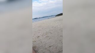 Stroking my cock and  relaxing on the beach