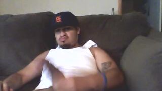 Horny fat mexican stroking his cock on the sofa