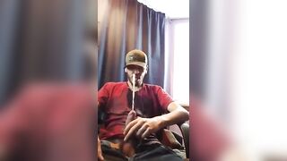 Horny white guy pissing while masturbating