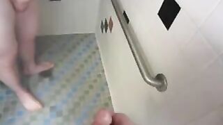 Masturbating in a public bathroom