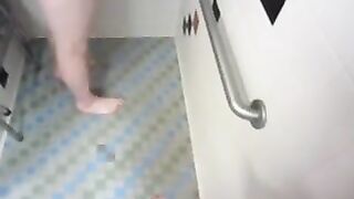 Masturbating in a public bathroom