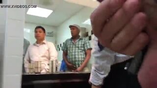 Spying a group of guys masturbate in a public bathroom