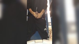 Horny young guy shows how his cock spits cum